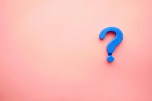 blue question mark, pink background