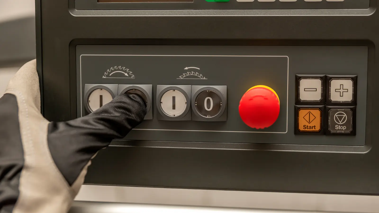Hand in glove pressing an on button