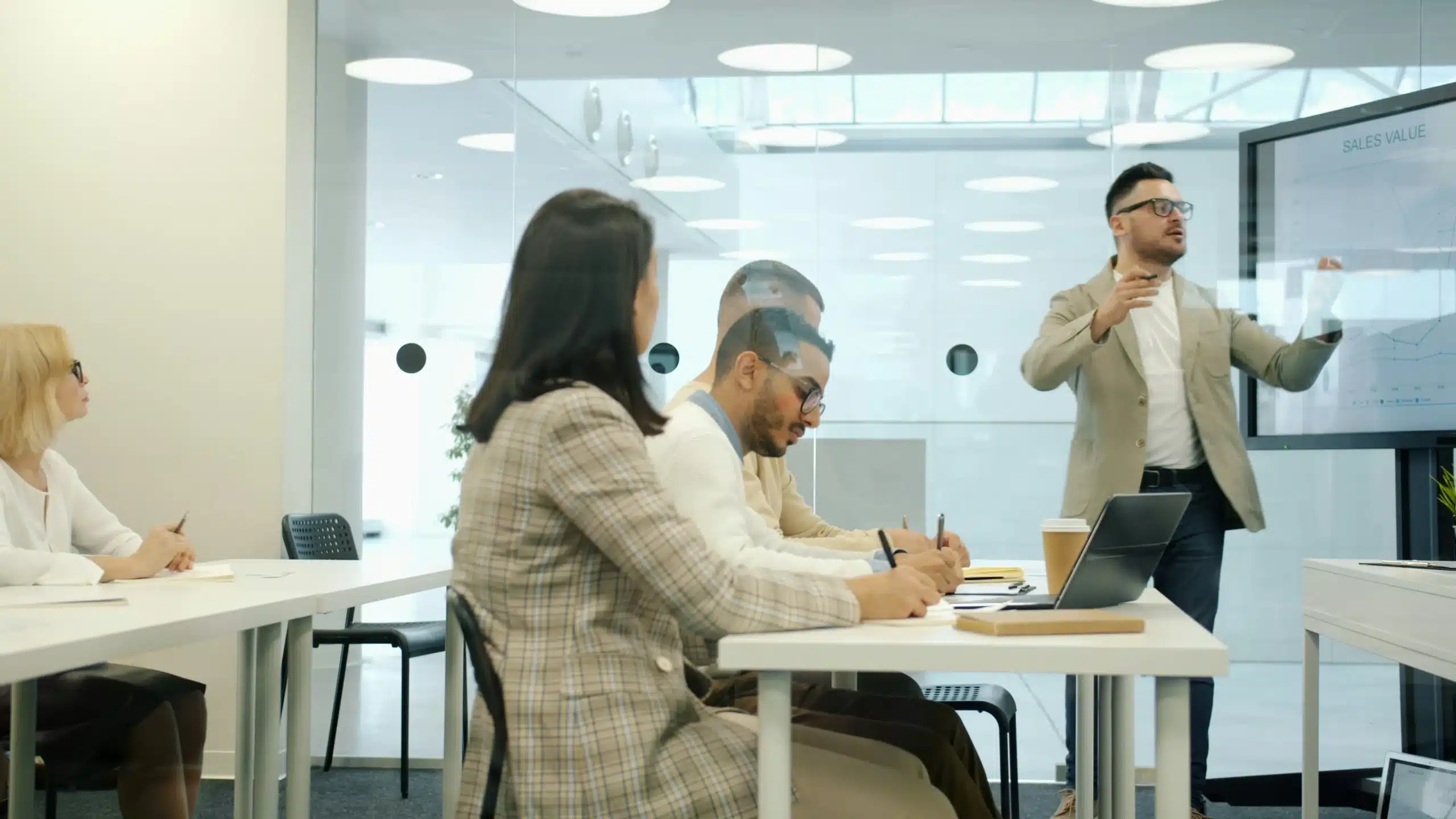 people taking notes during training session